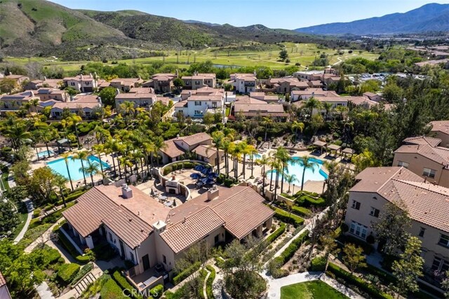 bird's eye view with a mountain view and a residential view