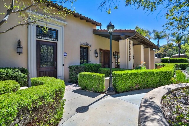 exterior space featuring stucco siding