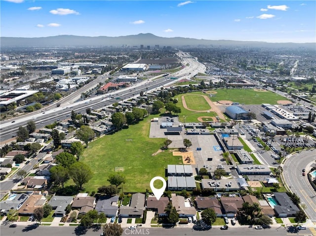 drone / aerial view featuring a mountain view