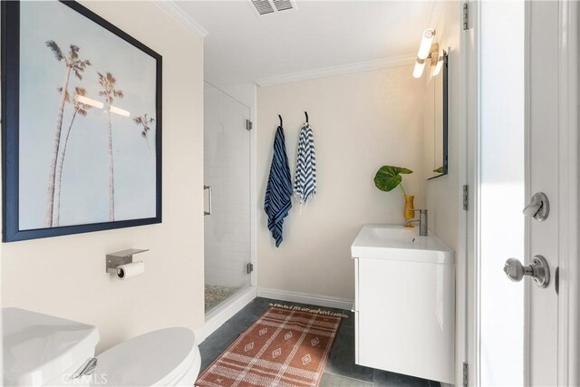 bathroom featuring vanity, a stall shower, crown molding, toilet, and visible vents