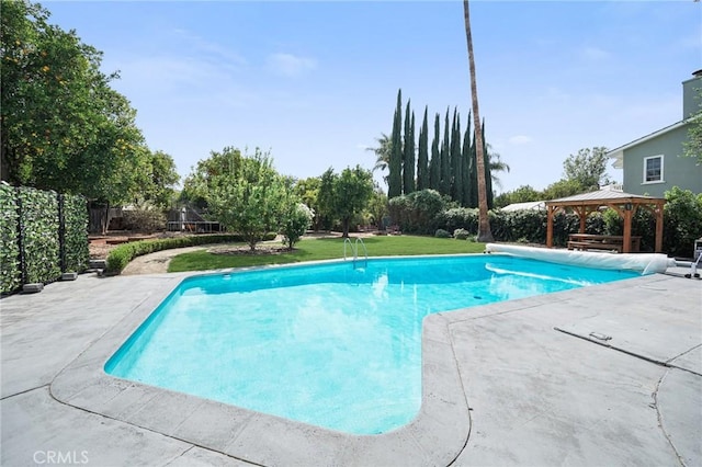 view of pool with a gazebo, a patio area, and a covered pool