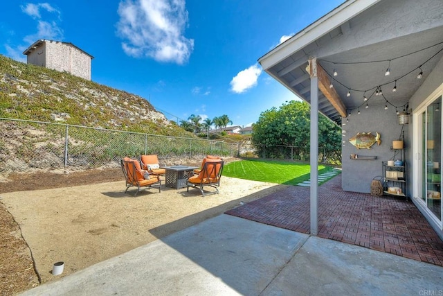2760 Thunder Dr, Oceanside, CA 92056 - fenced backyard featuring a fire pit and a patio area