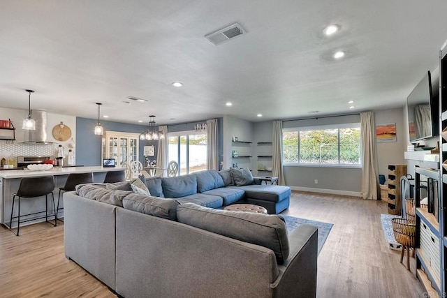 2760 Thunder Dr, Oceanside, CA 92056 - living room featuring light wood-style floors, recessed lighting, and a chandelier