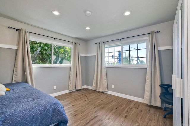2760 Thunder Dr, Oceanside, CA 92056 - bedroom featuring multiple windows, wood finished floors, and recessed lighting