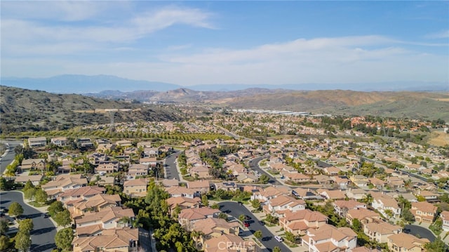 drone / aerial view with a residential view and a mountain view