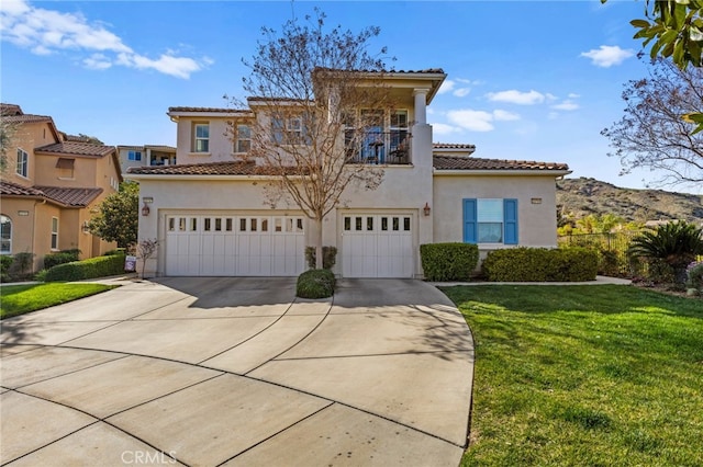 23757 Cahuilla Ct, Corona, CA 92883 - mediterranean / spanish home with a garage, a balcony, a tile roof, stucco siding, and driveway