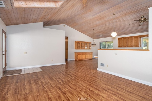 51674 Rd 426, Oakhurst, CA 93644 - unfurnished living room featuring visible vents, wood finished floors, vaulted ceiling, and wooden ceiling
