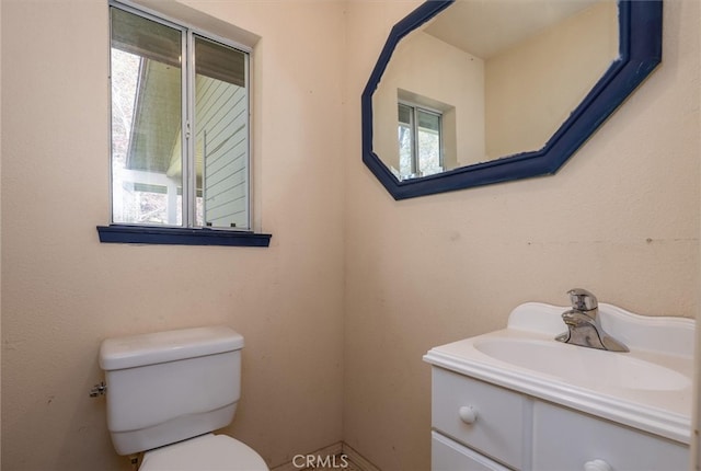 51674 Rd 426, Oakhurst, CA 93644 - bathroom featuring toilet, a healthy amount of sunlight, and vanity