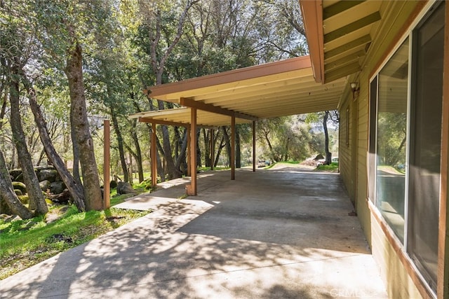 51674 Rd 426, Oakhurst, CA 93644 - view of patio / terrace featuring concrete driveway and a carport