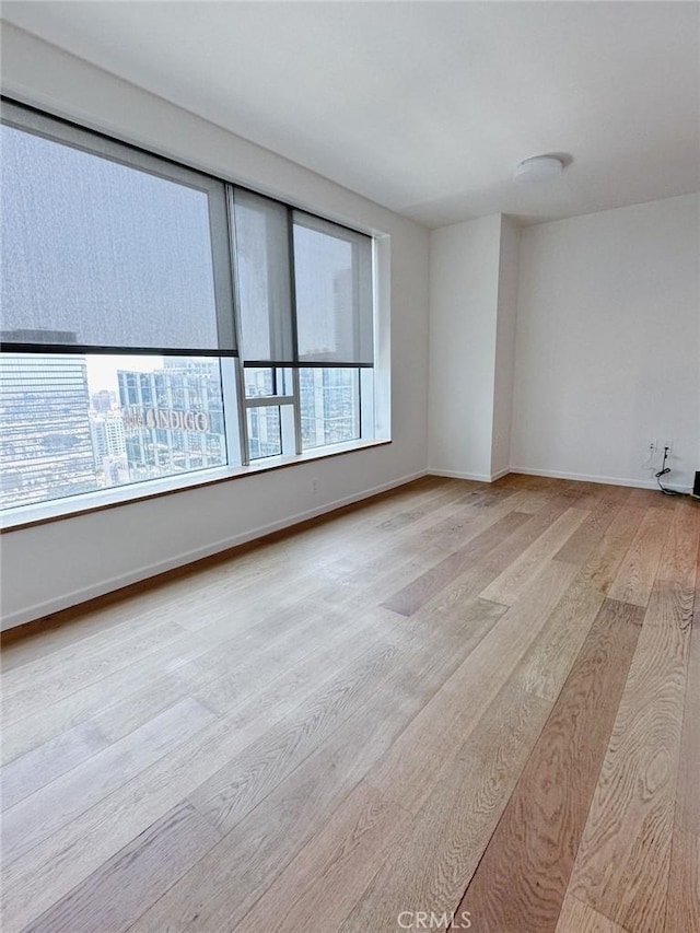 889 Francisco St Unit 2505, Los Angeles, CA 90017 - empty room with light wood-style flooring and baseboards