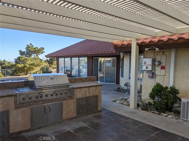 8802 Rubidoux Ave, Yucca Valley, CA 92284 - view of patio / terrace with exterior kitchen and a pergola