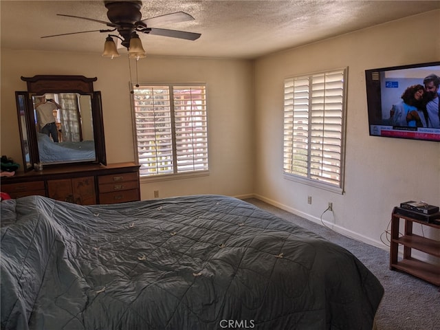 8802 Rubidoux Ave, Yucca Valley, CA 92284 - carpeted bedroom featuring a textured ceiling and ceiling fan