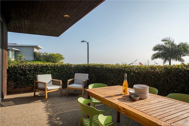view of patio featuring outdoor dining space