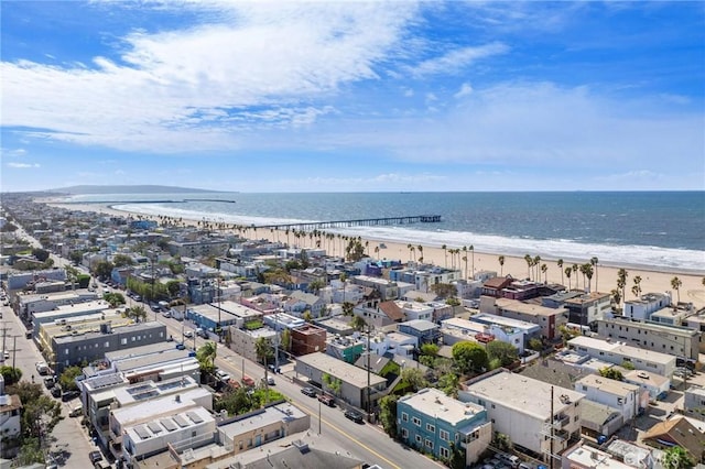 bird's eye view featuring a water view and a view of the beach