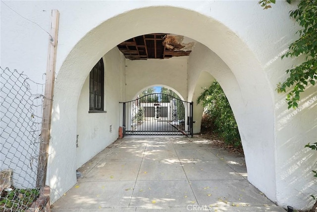 exterior space featuring a gate