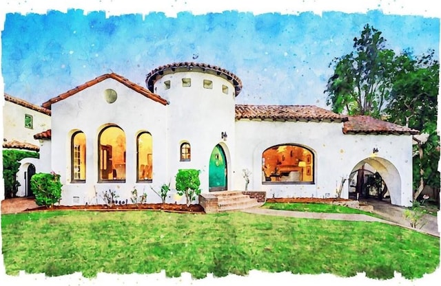 mediterranean / spanish home featuring a front yard, a tiled roof, and stucco siding