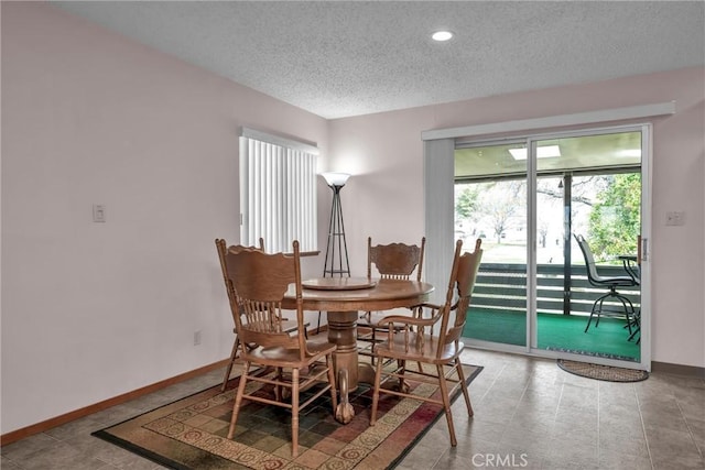 19506 Old Creek Rd, Hidden Valley Lake, CA 95467 - dining room with recessed lighting, baseboards, and a textured ceiling