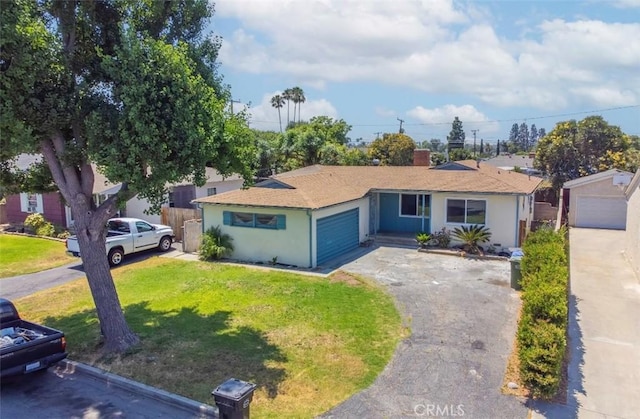 13526 Dunton Dr, Whittier, CA 90605 - single story home featuring an attached garage, a front lawn, driveway, a chimney, and roof with shingles