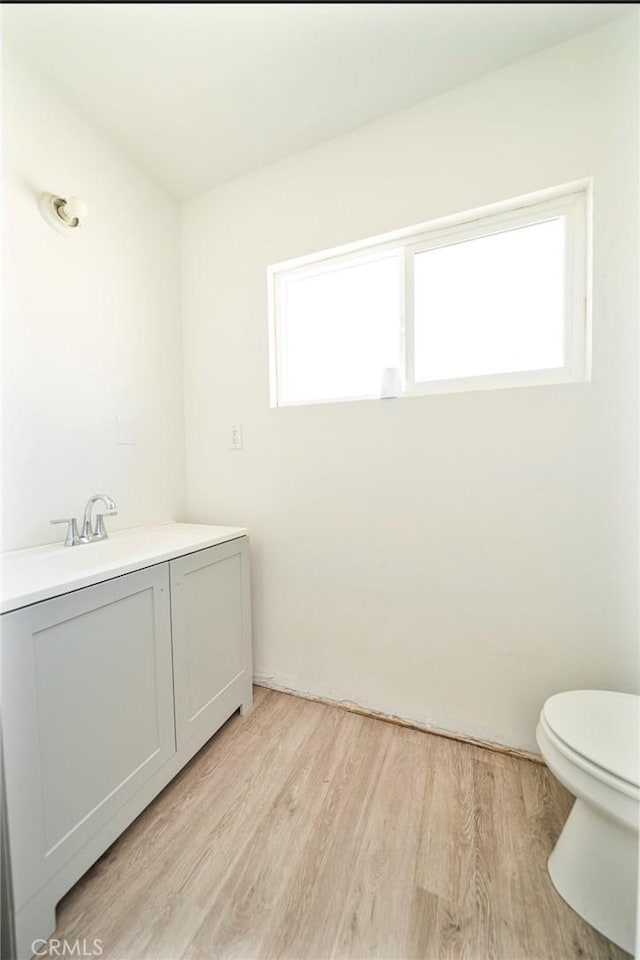 13526 Dunton Dr, Whittier, CA 90605 - bathroom with wood finished floors and vanity