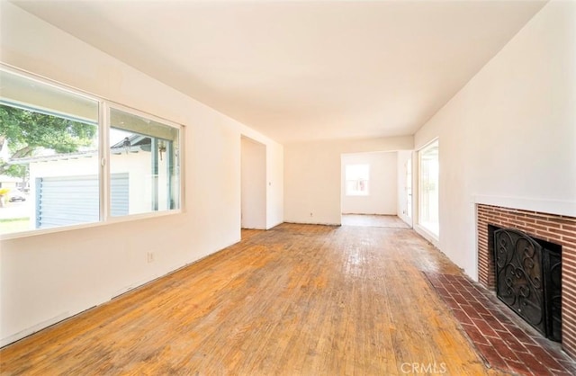 13526 Dunton Dr, Whittier, CA 90605 - unfurnished living room featuring a fireplace and wood finished floors