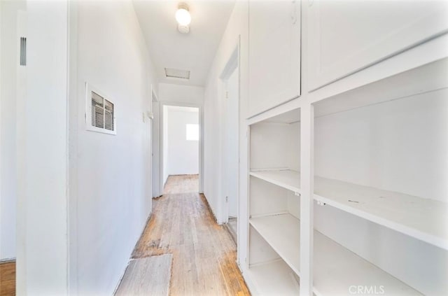 13526 Dunton Dr, Whittier, CA 90605 - hall with light wood-style floors and attic access