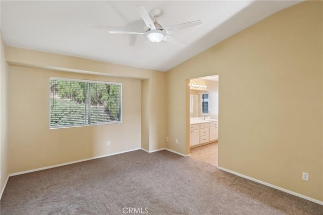 42042 Chestnut Dr, Temecula, CA 92591 - unfurnished room with vaulted ceiling, light carpet, baseboards, and a ceiling fan