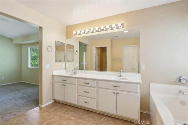 42042 Chestnut Dr, Temecula, CA 92591 - bathroom with double vanity, a garden tub, tile patterned flooring, and a sink