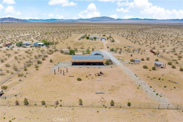 bird's eye view featuring a mountain view, a rural view, and view of desert