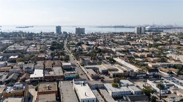 aerial view featuring a water view and a city view