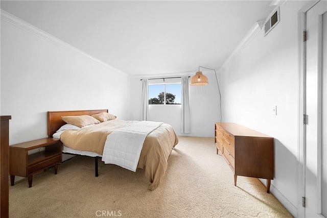 bedroom featuring light carpet, visible vents, and crown molding