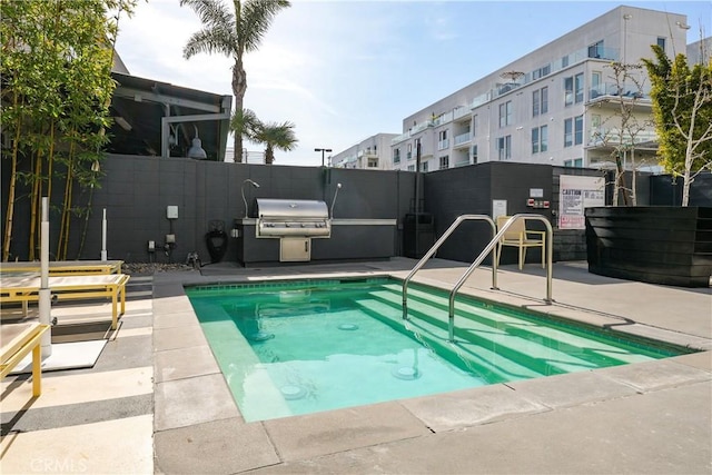4215 Glencoe Ave Unit 407, Marina Del Rey, CA 90292 - view of swimming pool featuring area for grilling, fence, and a patio