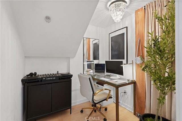4215 Glencoe Ave Unit 407, Marina Del Rey, CA 90292 - home office with a notable chandelier, wood finished floors, and lofted ceiling