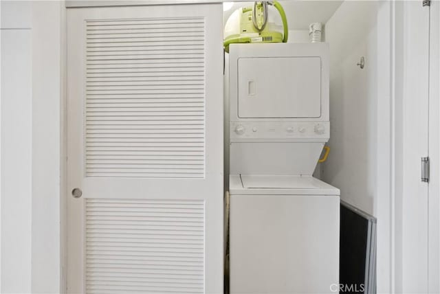 4215 Glencoe Ave Unit 407, Marina Del Rey, CA 90292 - clothes washing area featuring laundry area and stacked washing maching and dryer
