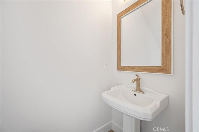 364 S Halcyon Rd, Arroyo Grande, CA 93420 - bathroom with a sink and baseboards