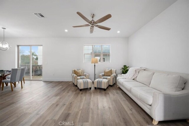 364 S Halcyon Rd, Arroyo Grande, CA 93420 - living room with wood finished floors, recessed lighting, a chandelier, ceiling fan, and baseboards