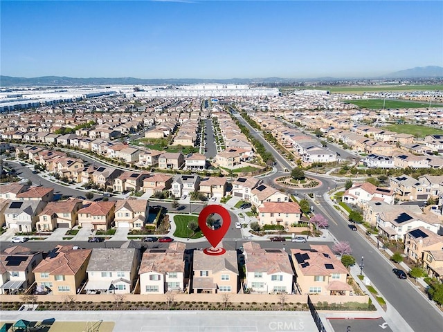 aerial view with a residential view and a mountain view