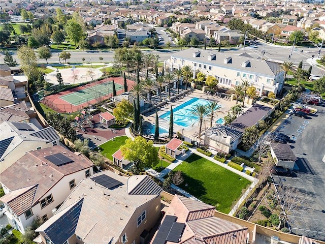 birds eye view of property with a residential view