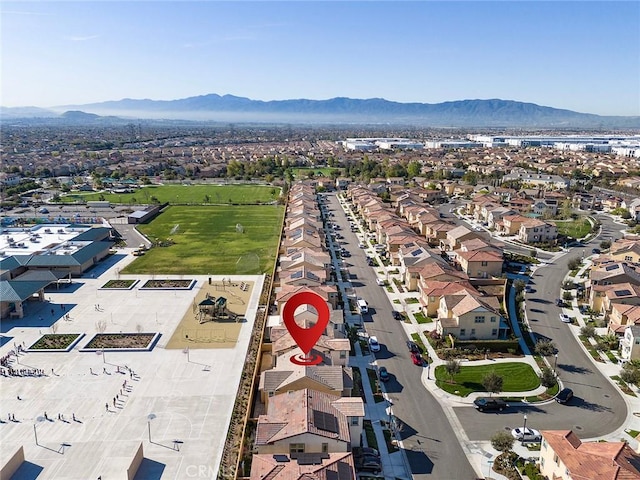 birds eye view of property with a residential view and a mountain view