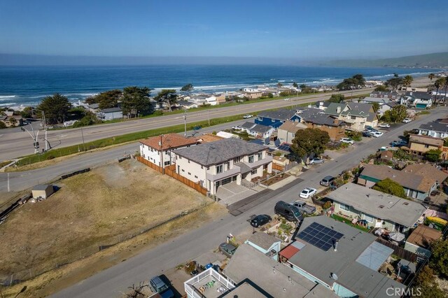 bird's eye view with a residential view and a water view