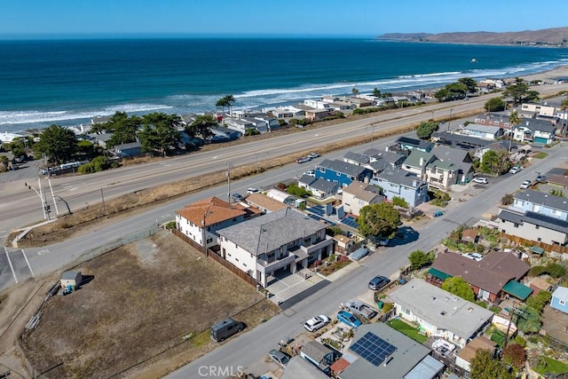 birds eye view of property featuring a residential view and a water view