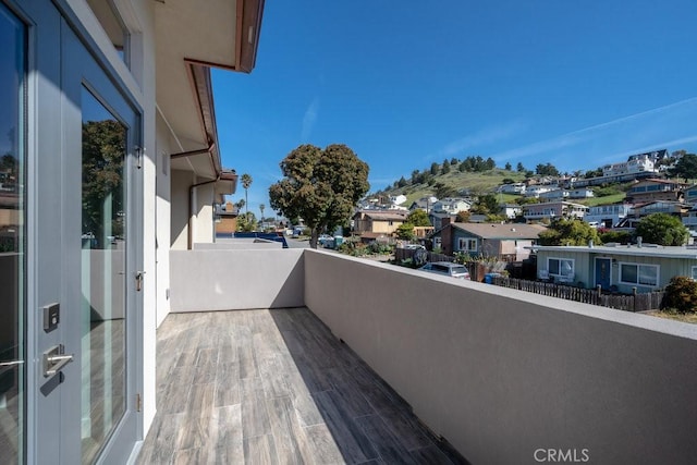 balcony featuring a residential view