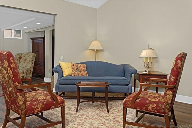 3685 Vista Campana N Unit 72, Oceanside, CA 92057 - living room featuring wood finished floors, baseboards, and recessed lighting
