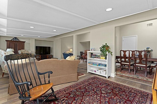 3685 Vista Campana N Unit 72, Oceanside, CA 92057 - living area featuring wood finished floors and recessed lighting