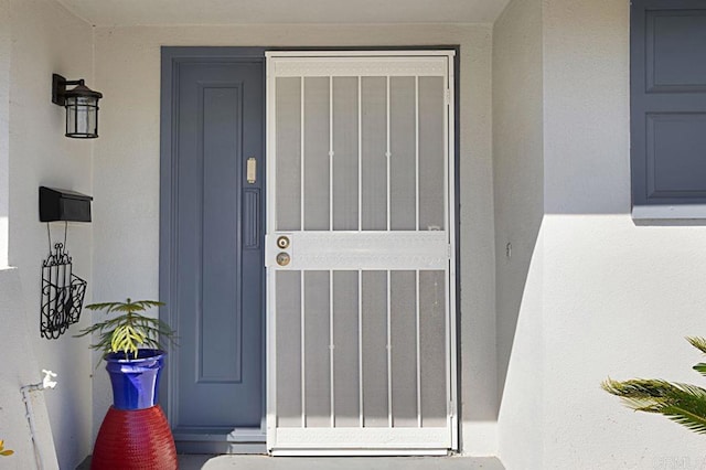 3685 Vista Campana N Unit 72, Oceanside, CA 92057 - property entrance featuring stucco siding