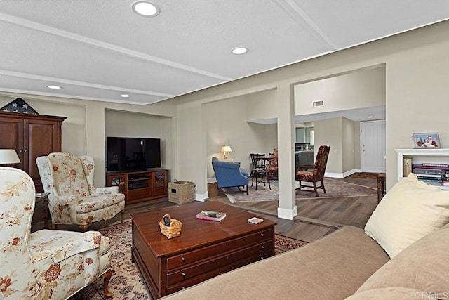 3685 Vista Campana N Unit 72, Oceanside, CA 92057 - living area with wood finished floors, recessed lighting, and baseboards