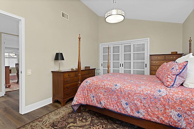 3685 Vista Campana N Unit 72, Oceanside, CA 92057 - bedroom with lofted ceiling, wood finished floors, and baseboards