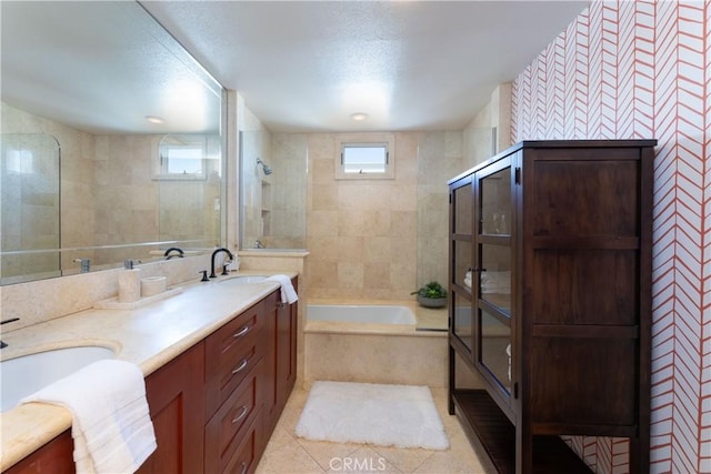 16865 S Pacific Ave, Sunset Beach, CA 90742 - bathroom with double vanity, a garden tub, and tile patterned flooring