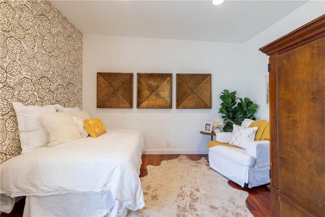 16865 S Pacific Ave, Sunset Beach, CA 90742 - bedroom with wood finished floors, baseboards, and recessed lighting