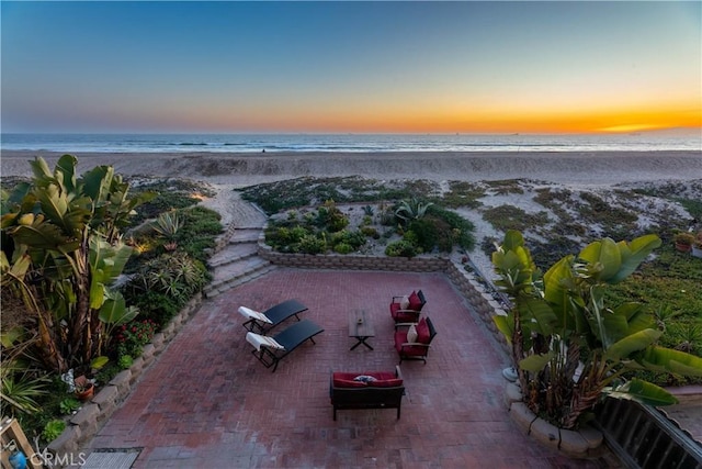 16865 S Pacific Ave, Sunset Beach, CA 90742 - patio terrace at dusk featuring view of water and beach
