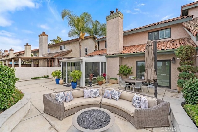627 Avery Pl, Long Beach, CA 90807 - view of patio featuring a sunroom, an outdoor living space, and outdoor dining area